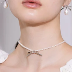 Ripple / Metal Bowknot Pearl Necklace