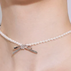 Ripple / Metal Bowknot Pearl Necklace