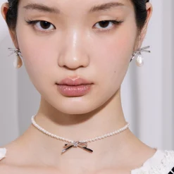 Ripple / Metal Bowknot Pearl Necklace